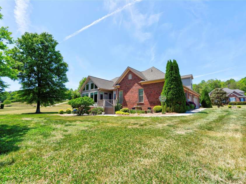 207 Cross Creek Drive, Cherryville, NC 28021.  MLS# CAR4373170, YatesRealty ID 14266. Rear & Left Side