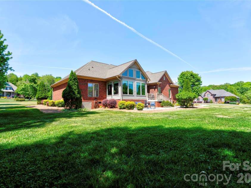 207 Cross Creek Drive, Cherryville, NC 28021.  MLS# CAR4373170, YatesRealty ID 14266. Rear & Right Side