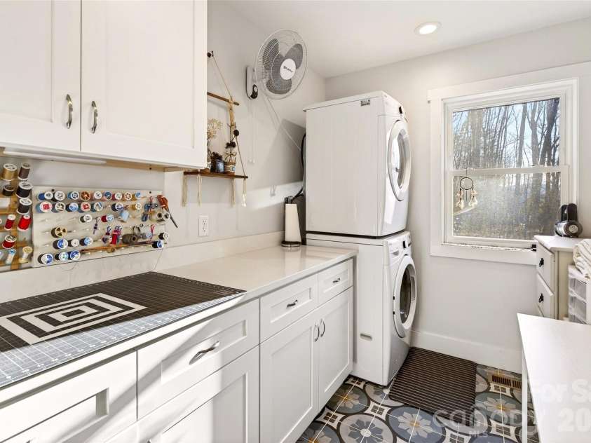 1413 Golf Course Road, Old Fort, NC 28762.  MLS# CAR4334798, YatesRealty ID 14272. Craft, utility and laundry room.