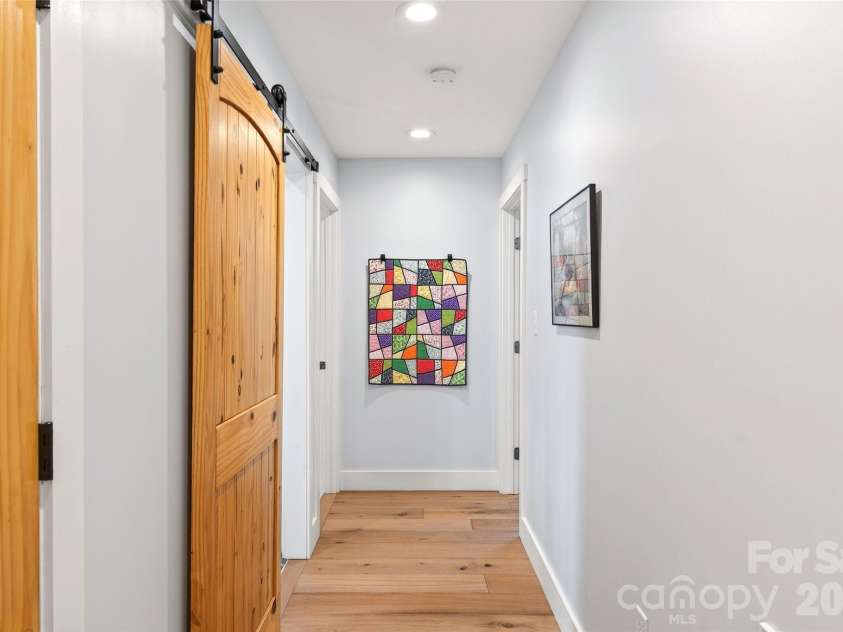 1413 Golf Course Road, Old Fort, NC 28762.  MLS# CAR4334798, YatesRealty ID 14272. Light-filled hallways.