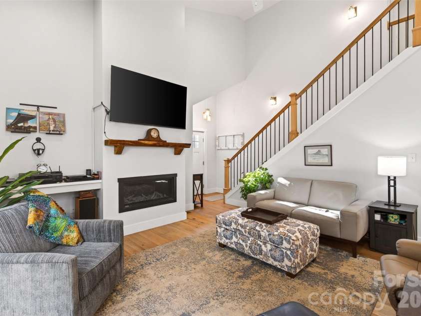 1413 Golf Course Road, Old Fort, NC 28762.  MLS# CAR4334798, YatesRealty ID 14272. Main floor great room.