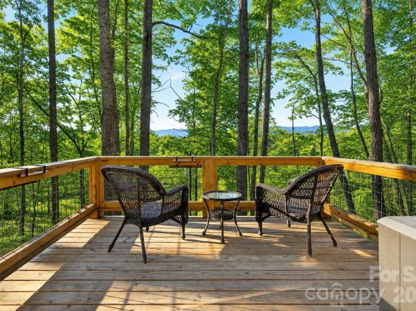 1413 Golf Course Road, Old Fort, NC 28762.  MLS# CAR4334798, YatesRealty ID 14272. Morning coffee never tasted better than here. Private deck off primary bedroom on the main floor.