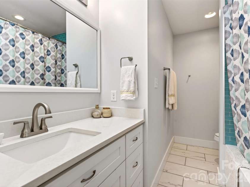 1413 Golf Course Road, Old Fort, NC 28762.  MLS# CAR4334798, YatesRealty ID 14272. Second level bathroom.