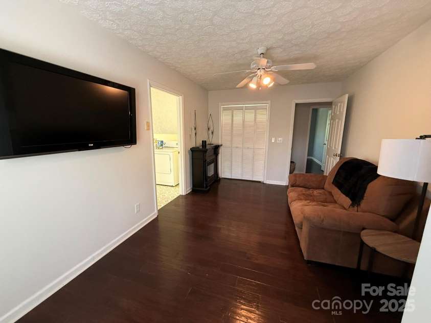 2835 DAV Avenue, Morganton, NC 28655.  MLS# CAR4239604, YatesRealty ID 14273. Upstairs TV Room