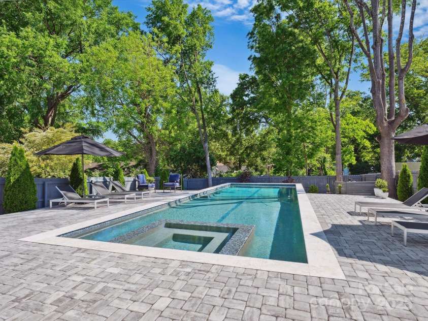 1009 Belmont Avenue, Charlotte, NC 28205.  MLS# CAR4252880, YatesRealty ID 14275. Custom heated pool/spa