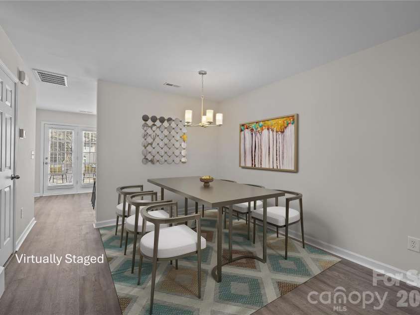 209 Primrose Walk, Fort Mill, SC 29715.  MLS# CAR4346413, YatesRealty ID 14281. Nicely sized dining area, positioned between the living room and kitchen is ideal for everyday meals or entertaining. Open flow design keeps the space connected while maintaining clear definition.