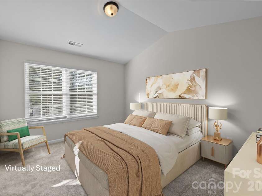 209 Primrose Walk, Fort Mill, SC 29715.  MLS# CAR4346413, YatesRealty ID 14281. Spacious second bedroom suite on upper floor with vaulted ceiling, brand new plush carpet, and double window for natural light.