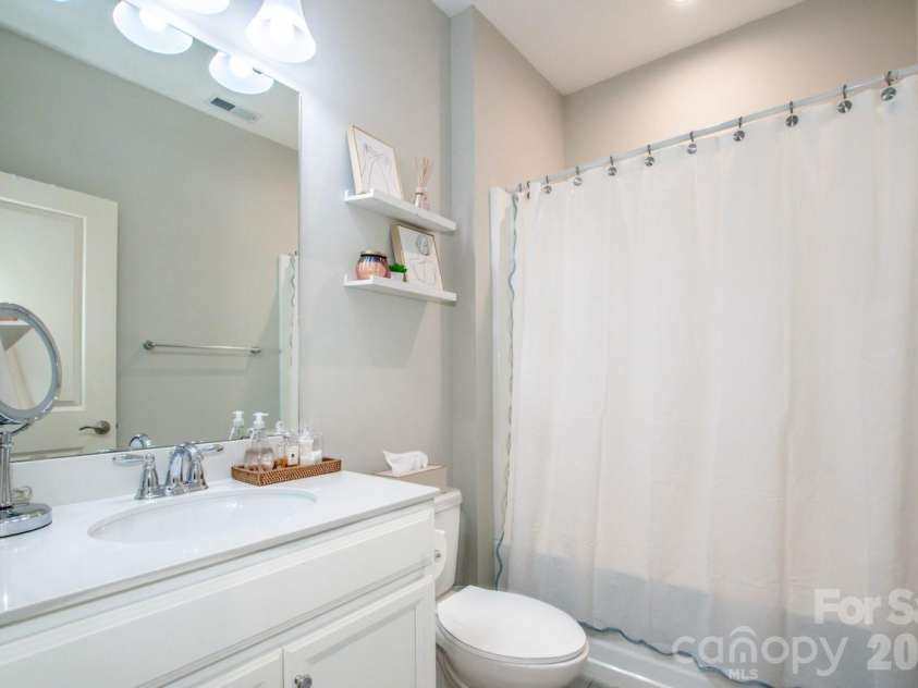 13621 Old Vermillion Drive, Huntersville, NC 28078.  MLS# CAR4370576, YatesRealty ID 14286. Full bath on the upper level serves the additional 2 BR's