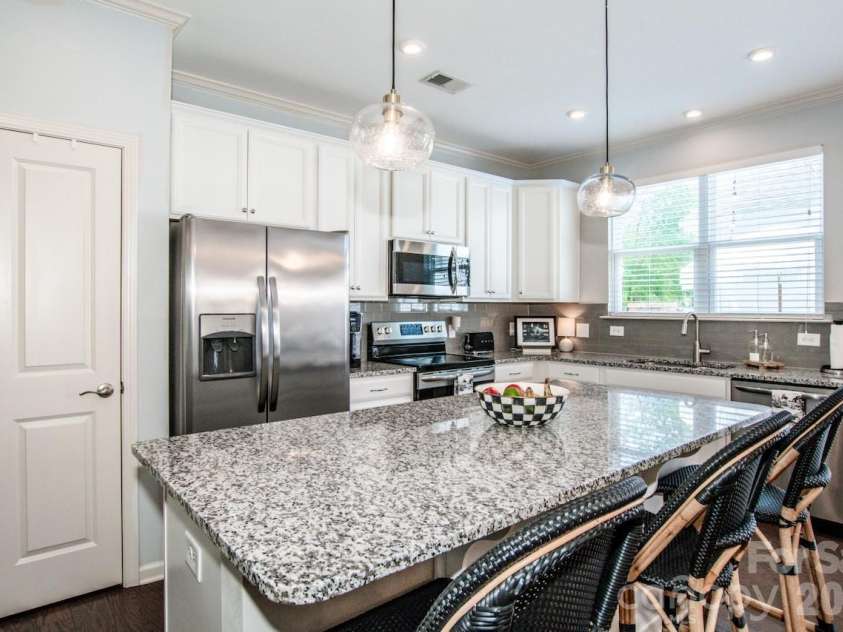13621 Old Vermillion Drive, Huntersville, NC 28078.  MLS# CAR4370576, YatesRealty ID 14286. Sizable kitchen island with seating 