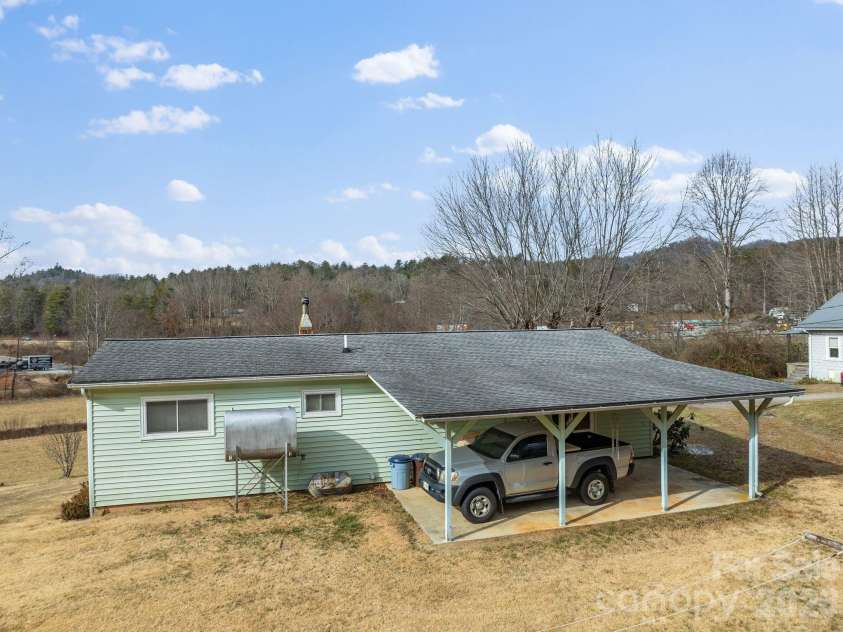 146 and 148 Monteith Road, Brevard, NC 28712.  MLS# CAR4342574, YatesRealty ID 1429. 146 Monteith Road - Back