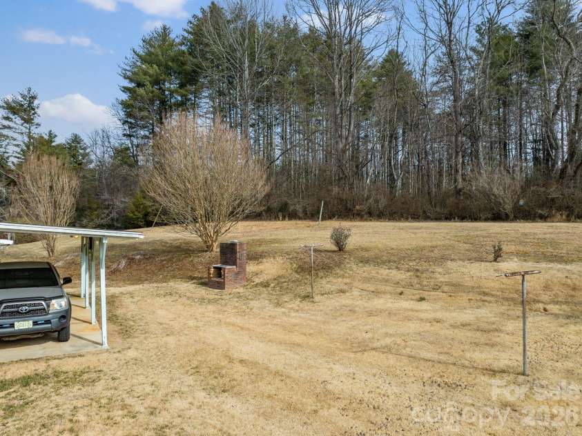 146 and 148 Monteith Road, Brevard, NC 28712.  MLS# CAR4342574, YatesRealty ID 1429. 146 Monteith Road - Back