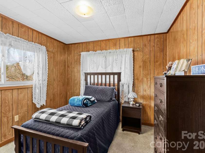 146 and 148 Monteith Road, Brevard, NC 28712.  MLS# CAR4342574, YatesRealty ID 1429. 146 Monteith Road - Bedroom