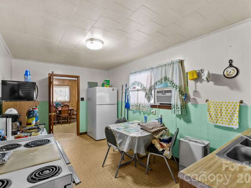 146 and 148 Monteith Road, Brevard, NC 28712.  MLS# CAR4342574, YatesRealty ID 1429. 146 Monteith Road - Kitchen