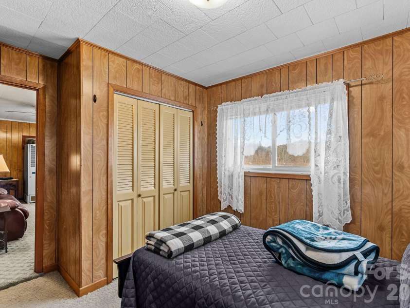 146 and 148 Monteith Road, Brevard, NC 28712.  MLS# CAR4343825, YatesRealty ID 1429. 146 Monteith Road - Bedroom