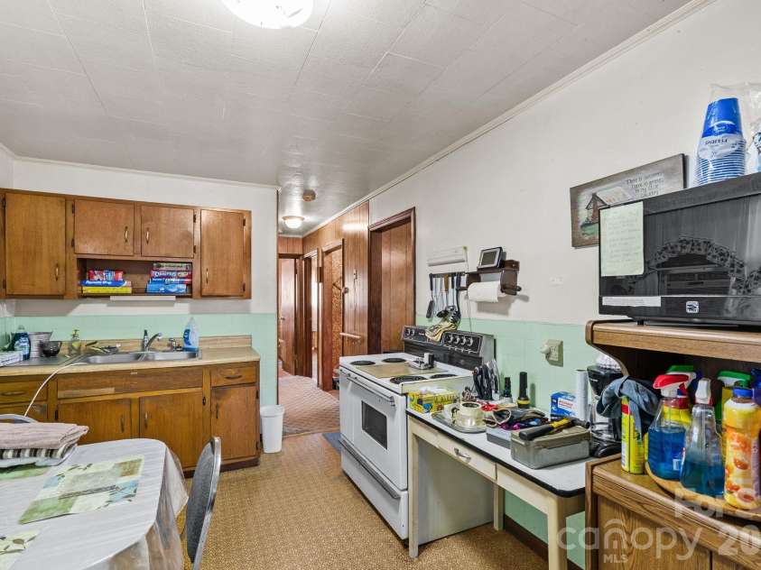 146 and 148 Monteith Road, Brevard, NC 28712.  MLS# CAR4343825, YatesRealty ID 1429. 146 Monteith Road - Kitchen