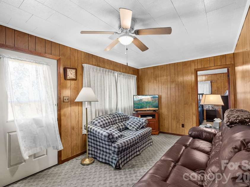 146 and 148 Monteith Road, Brevard, NC 28712.  MLS# CAR4343825, YatesRealty ID 1429. 146 Monteith Road - Living Room