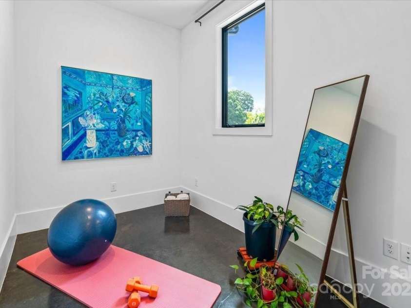 3304 Mar Vista Circle, Charlotte, NC 28209.  MLS# CAR4269142, YatesRealty ID 1429. Flex space on first floor is perfect for a workout space, office, or tech studio.