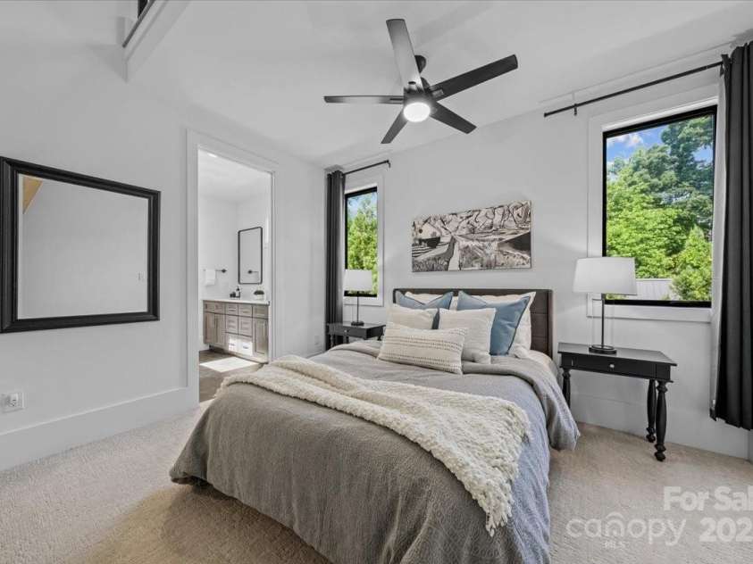 3304 Mar Vista Circle, Charlotte, NC 28209.  MLS# CAR4269142, YatesRealty ID 1429. Loft space between the upper lever bedrooms includes windows and closet access for additional storage 