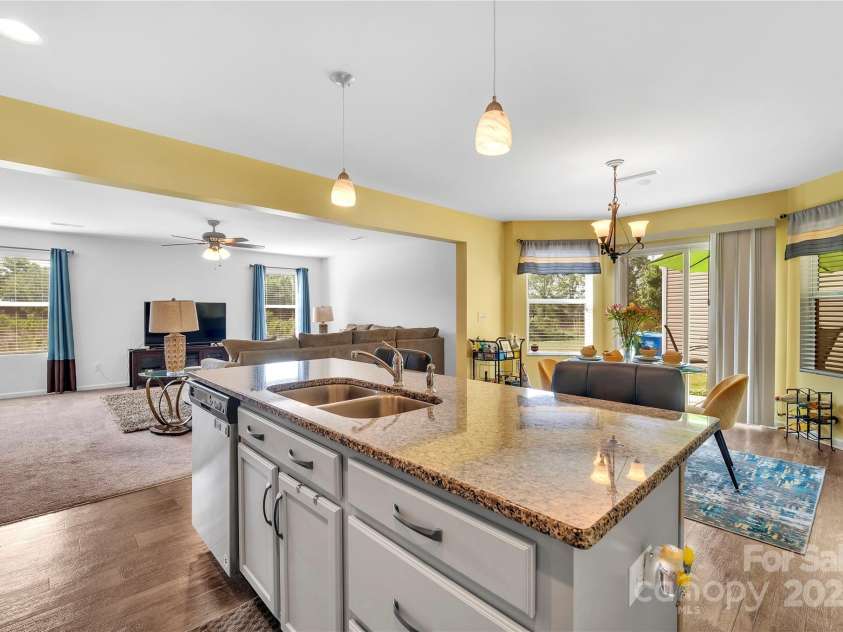 3578 Saddlebrook Drive, Midland, NC 28107.  MLS# CAR4252772, YatesRealty ID 14291. Oversized island, perfect for meal prep. Open to living and dining area, perfect for entertaining guests.