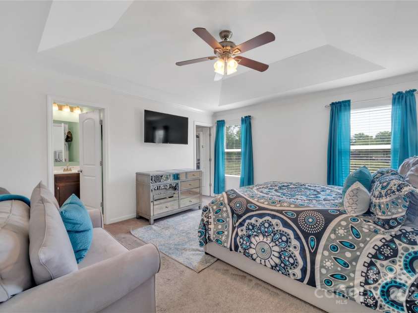 3578 Saddlebrook Drive, Midland, NC 28107.  MLS# CAR4252772, YatesRealty ID 14291. Primary bedroom, second floor with tray ceiling.