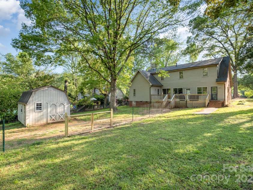 119 Lakenheath Lane, Matthews, NC 28105.  MLS# CAR4241430, YatesRealty ID 14292. Large backyard