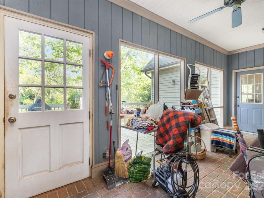 119 Lakenheath Lane, Matthews, NC 28105.  MLS# CAR4241430, YatesRealty ID 14292. Sunroom overlooking deck