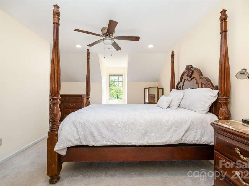 119 Lakenheath Lane, Matthews, NC 28105.  MLS# CAR4241430, YatesRealty ID 14292. Third bedroom on upper level with window seat