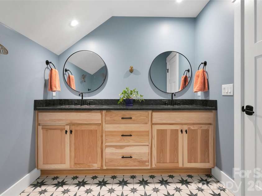 71 Hidden Pond Lane, Brevard, NC 28712.  MLS# CAR4367829, YatesRealty ID 14300. 3rd Full Bathroom on the second level.