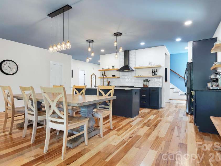 71 Hidden Pond Lane, Brevard, NC 28712.  MLS# CAR4367829, YatesRealty ID 14300. Area for a large dining table for entertaining.