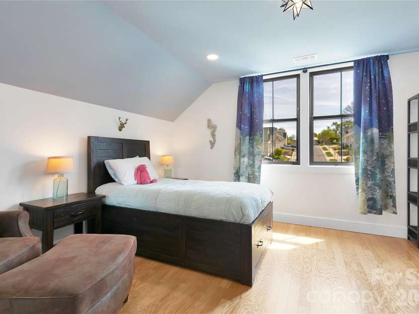 71 Hidden Pond Lane, Brevard, NC 28712.  MLS# CAR4367829, YatesRealty ID 14300. Bedroom on the second level with great views