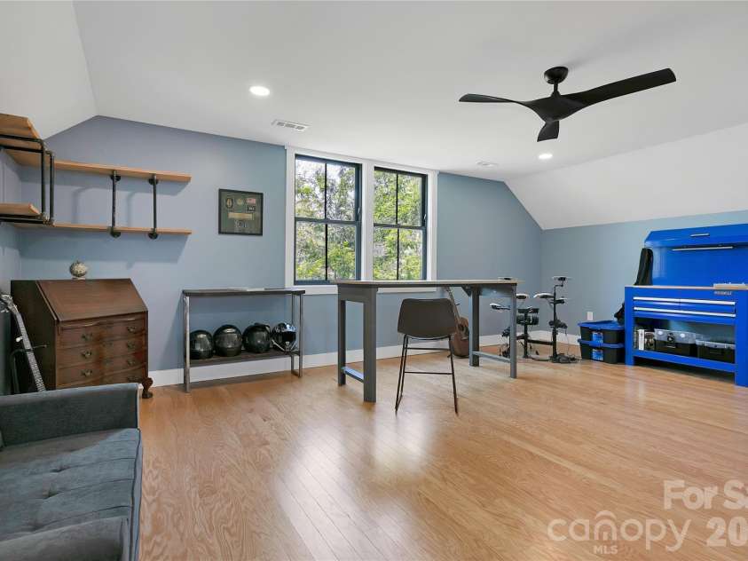 71 Hidden Pond Lane, Brevard, NC 28712.  MLS# CAR4367829, YatesRealty ID 14300. Bonus Room on second level is currently being used as a man cave.