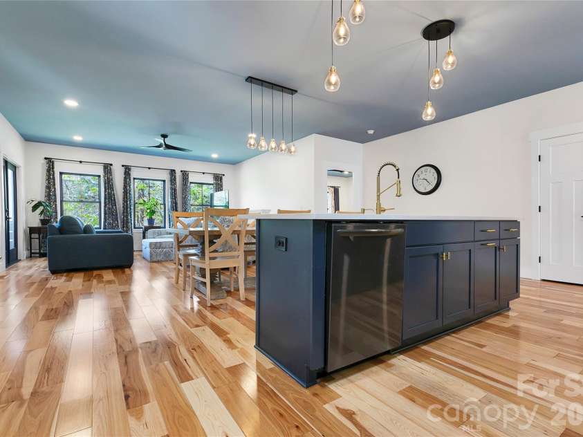 71 Hidden Pond Lane, Brevard, NC 28712.  MLS# CAR4367829, YatesRealty ID 14300. Do not miss your guests conversations while you are cooking.