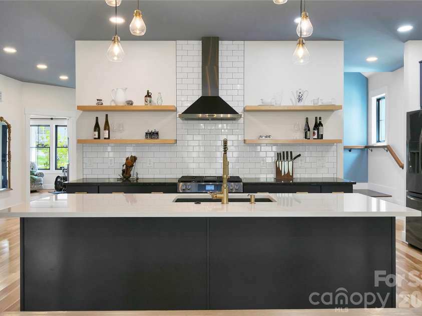 71 Hidden Pond Lane, Brevard, NC 28712.  MLS# CAR4367829, YatesRealty ID 14300. View of kitchen from the Dining Area.