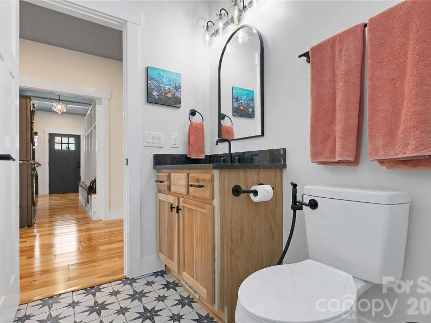 71 Hidden Pond Lane, Brevard, NC 28712.  MLS# CAR4367829, YatesRealty ID 14300. Which is accessed from the main level hall.