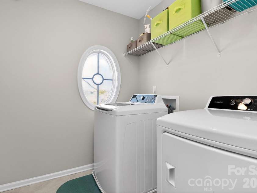 2159 Black Forest Cove, Concord, NC 28027.  MLS# CAR4368513, YatesRealty ID 14303. Laundry Room Upstairs