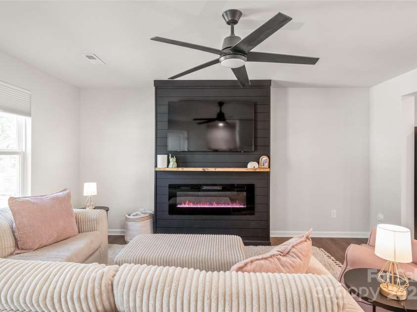 5023 Daybell Street, Charlotte, NC 28214.  MLS# CAR4261011, YatesRealty ID 14305. Amazing custom woodwork with built-in electric fireplace.