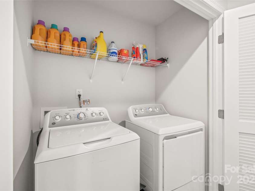 5023 Daybell Street, Charlotte, NC 28214.  MLS# CAR4261011, YatesRealty ID 14305. Laundry on upper floor.