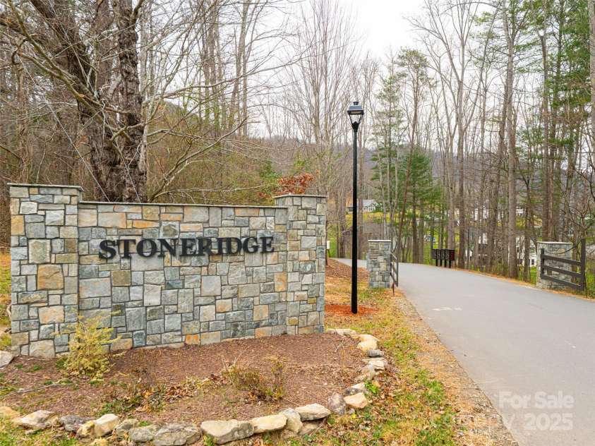 51 Bridgeway Drive, Candler, NC 28715.  MLS# CAR4327659, YatesRealty ID 14309. 
