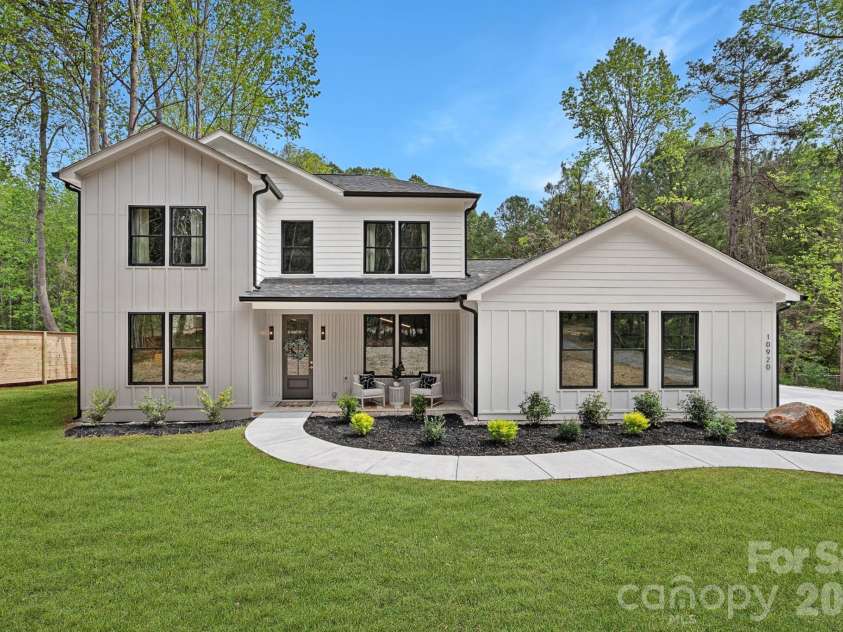 10920 McCoy Road, Huntersville, NC 28078.  MLS# CAR4366562, YatesRealty ID 14313. Digitally enhanced grass