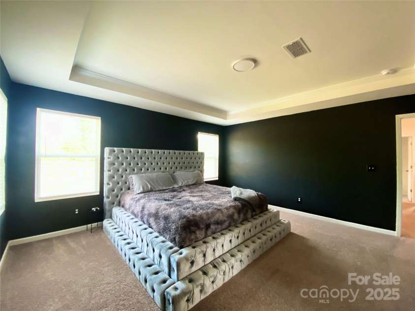 7024 Wheyfield Drive, Charlotte, NC 28215.  MLS# CAR4261523, YatesRealty ID 14325. Primary bedroom