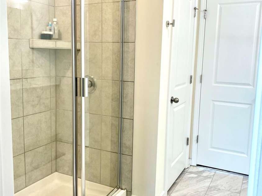 7024 Wheyfield Drive, Charlotte, NC 28215.  MLS# CAR4261523, YatesRealty ID 14325. Primary standup shower