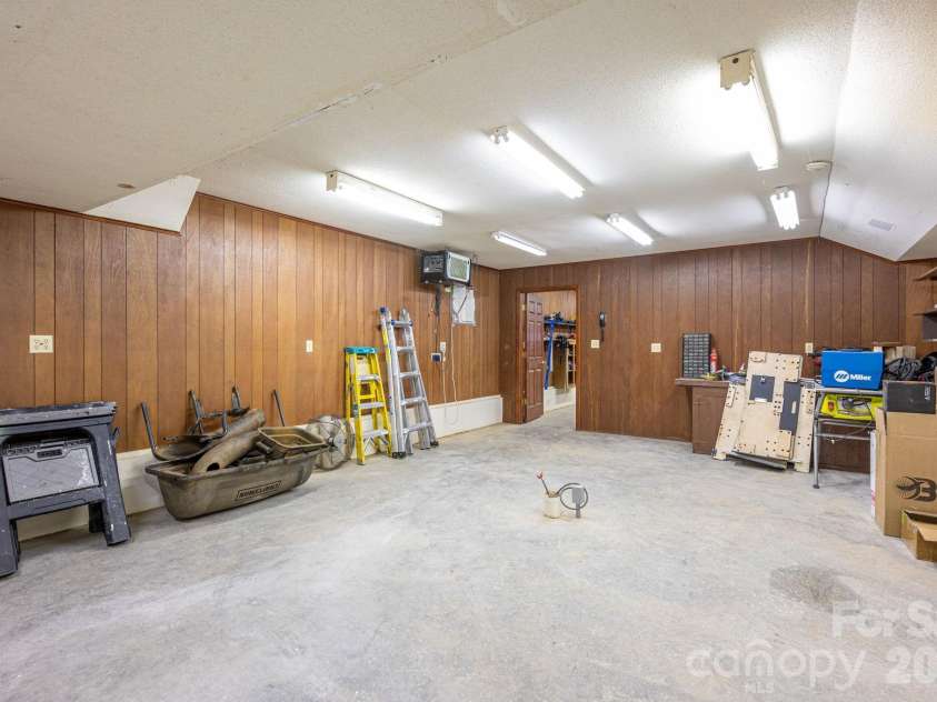 2835 Wimbledon Drive, Gastonia, NC 28056.  MLS# CAR4364886, YatesRealty ID 14331. Basement Workshop