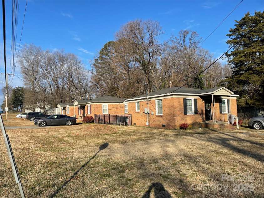 1902 Catherine Simmons Avenue, Charlotte, NC 28216.  MLS# CAR4291476, YatesRealty ID 1434. Three Houses