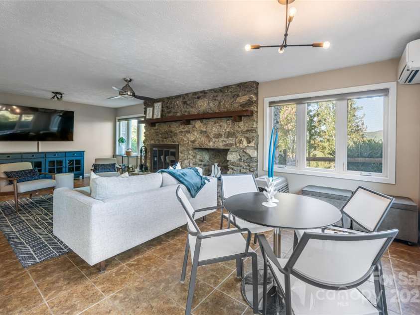 79 Horizon Hill Road, Asheville, NC 28804.  MLS# CAR4306563, YatesRealty ID 14340. Lower Level Dining