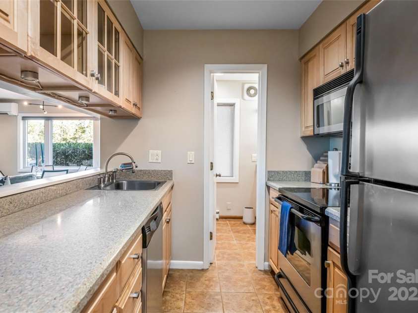 79 Horizon Hill Road, Asheville, NC 28804.  MLS# CAR4306563, YatesRealty ID 14340. Lower Level Kitchen