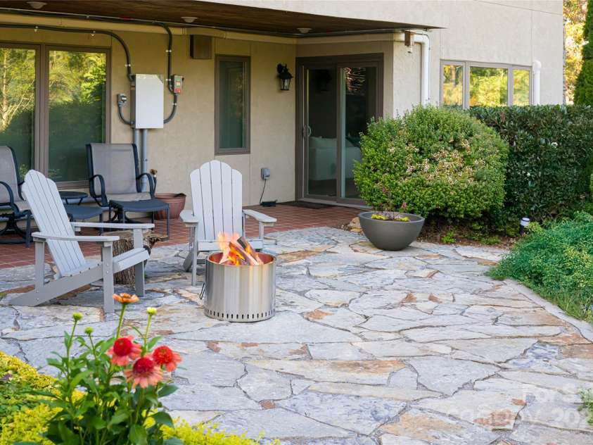 79 Horizon Hill Road, Asheville, NC 28804.  MLS# CAR4306563, YatesRealty ID 14340. Lower Patio