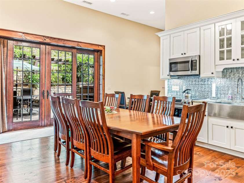 202 Emerald Lane, Maggie Valley, NC 28751.  MLS# CAR4047356, YatesRealty ID 14350. Guest House kitchen/dining