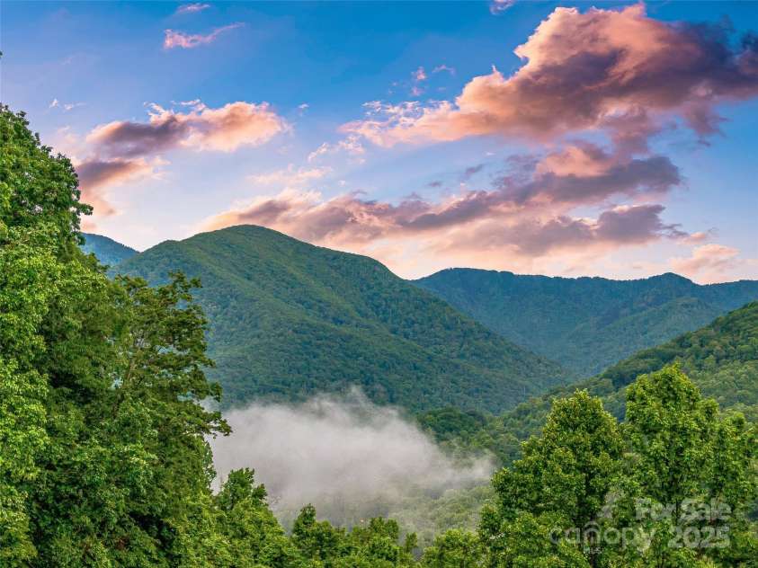 202 Emerald Lane, Maggie Valley, NC 28751.  MLS# CAR4047356, YatesRealty ID 14350. Just another perfect day in you NC mountain castle.