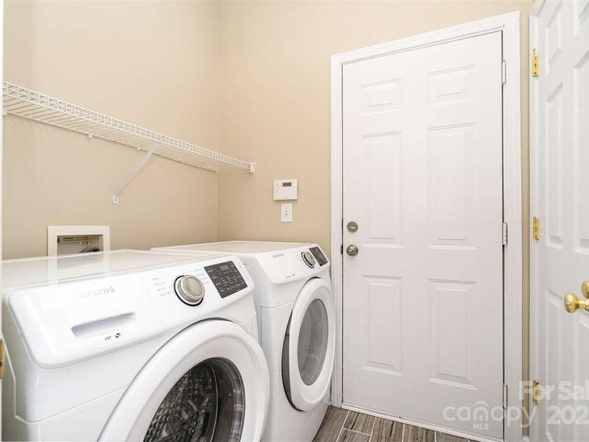 2514 Waters Vista Circle, Charlotte, NC 28213.  MLS# CAR4240411, YatesRealty ID 14353. Laundry room on main floor in mudroom