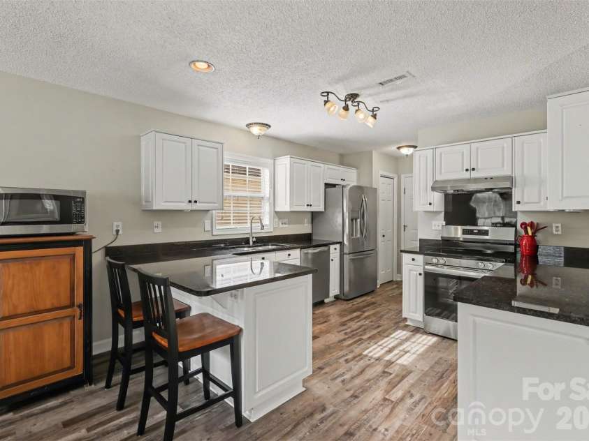 4404 Stonefield Drive, Charlotte, NC 28269.  MLS# CAR4364887, YatesRealty ID 14354. 